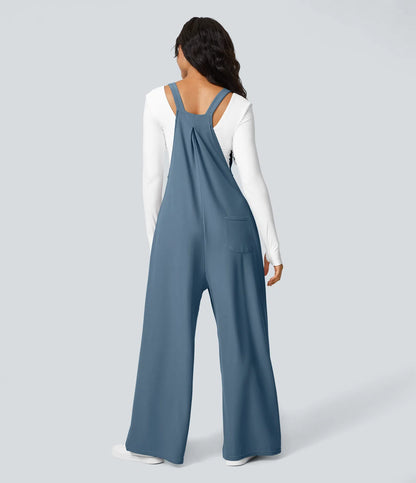Anna | Pantalones con tirantes, botones ajustables en los tirantes y varios bolsillos